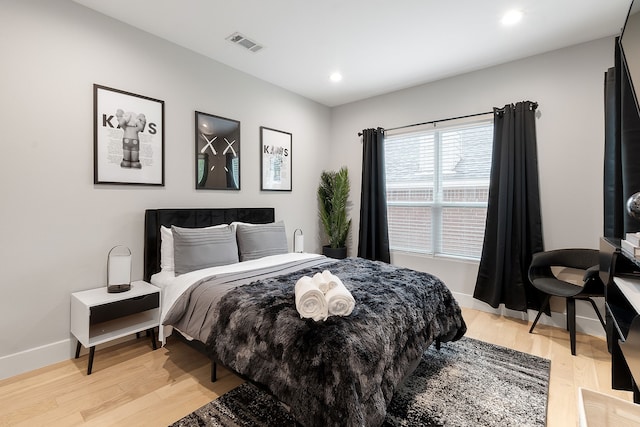 bedroom featuring light wood-type flooring