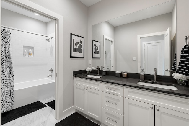 bathroom featuring vanity and shower / bath combo with shower curtain