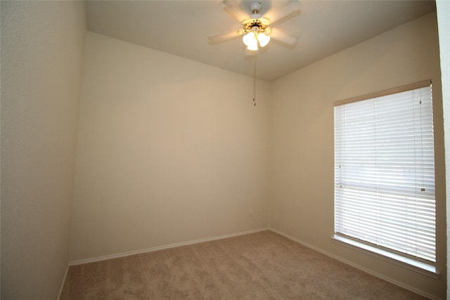 unfurnished room with carpet floors and ceiling fan