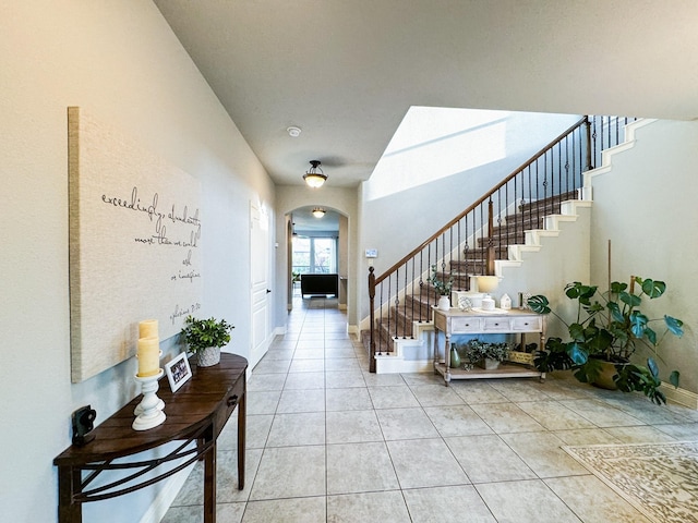 entrance foyer featuring light tile patterned floors