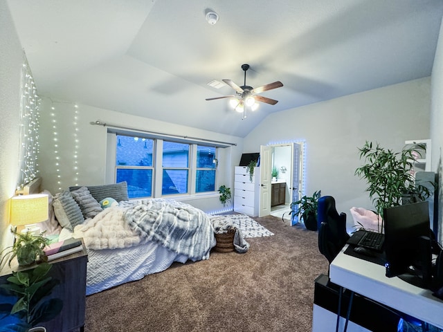 carpeted bedroom featuring connected bathroom, ceiling fan, and vaulted ceiling