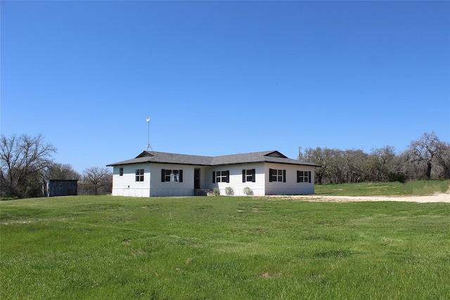 view of front of home with a front lawn