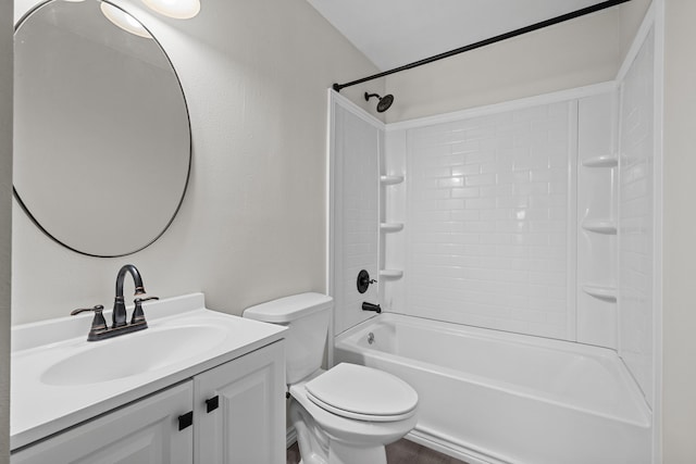 bathroom featuring  shower combination, vanity, and toilet