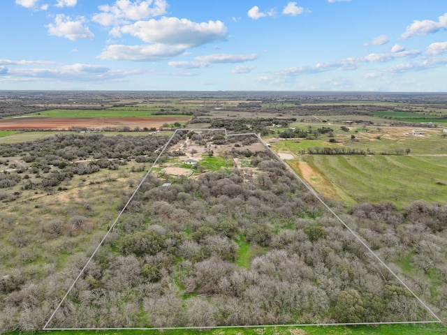 birds eye view of property featuring a rural view