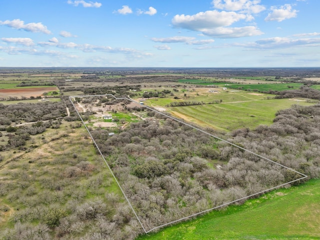 birds eye view of property featuring a rural view