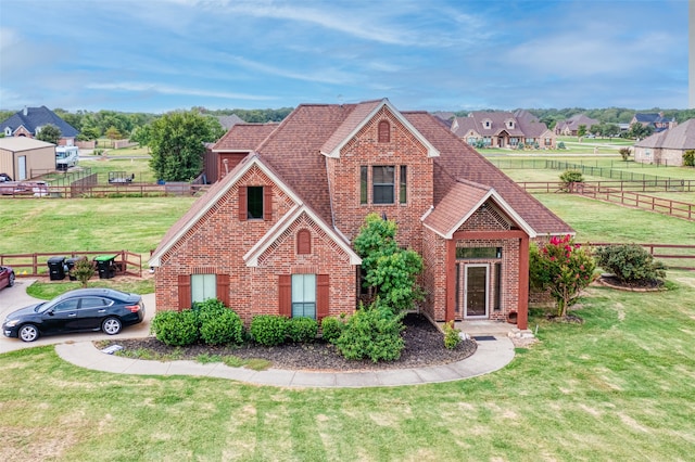 view of front of property featuring a front lawn