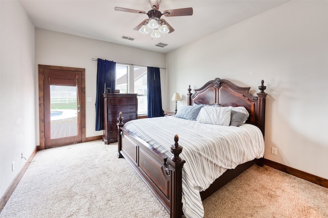 carpeted bedroom with access to outside and ceiling fan