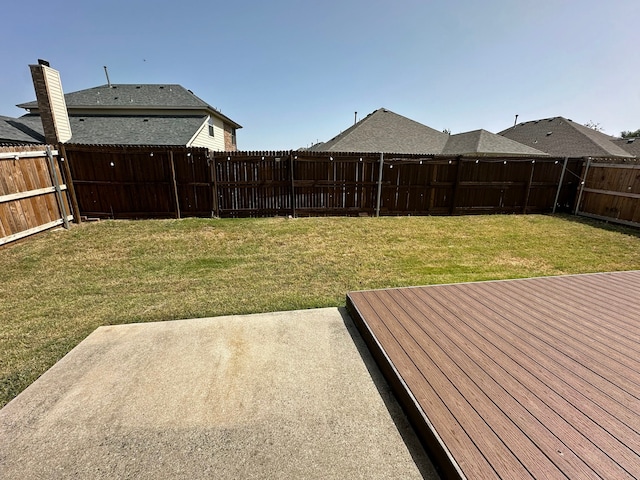 view of yard featuring a deck