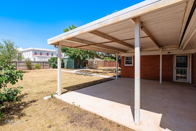 view of patio / terrace featuring a shed