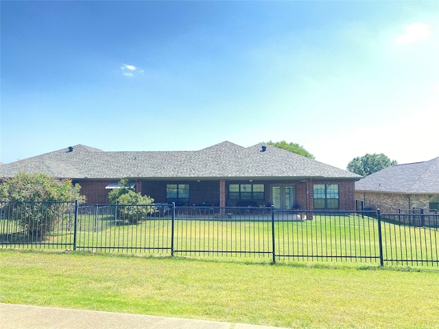 view of front of home featuring a front yard