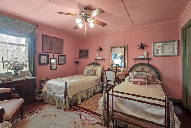 bedroom with wood-type flooring and ceiling fan