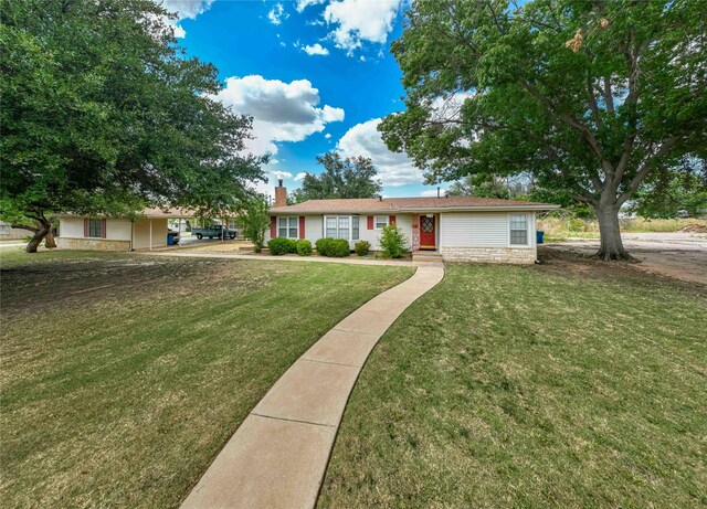 single story home featuring a front yard