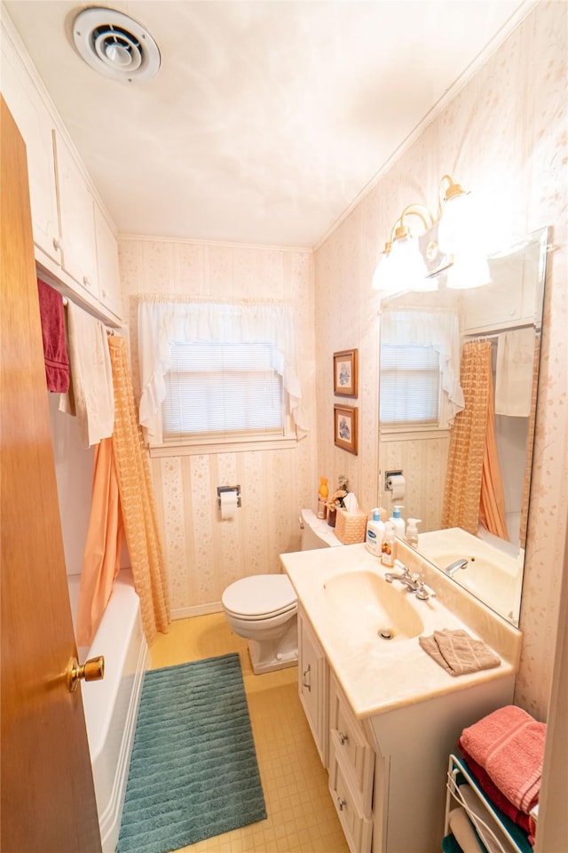 full bathroom with toilet, vanity, and shower / bathtub combination with curtain