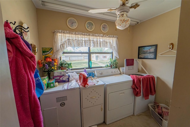 laundry room with ceiling fan and washing machine and dryer