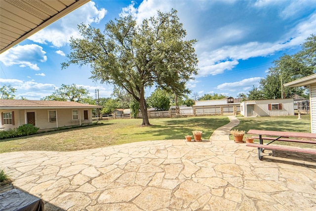 view of patio with an outdoor structure