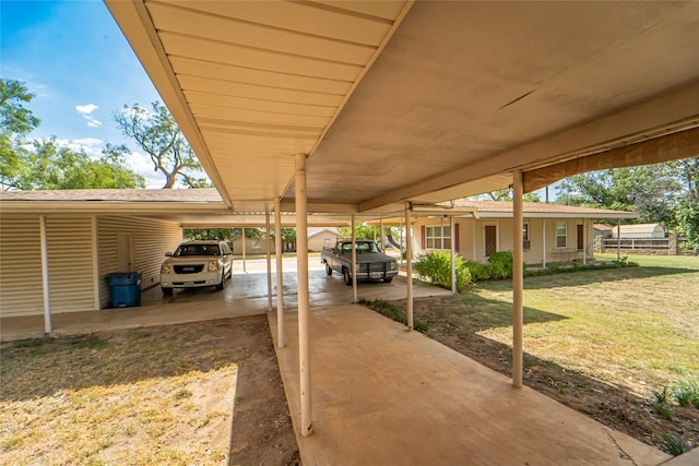 exterior space with a carport