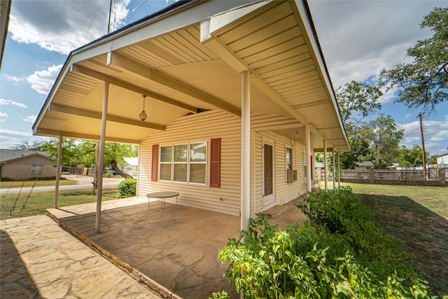 view of home's exterior with a patio area