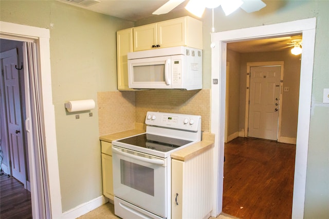 kitchen featuring backsplash, ceiling fan, white appliances, and hardwood / wood-style floors