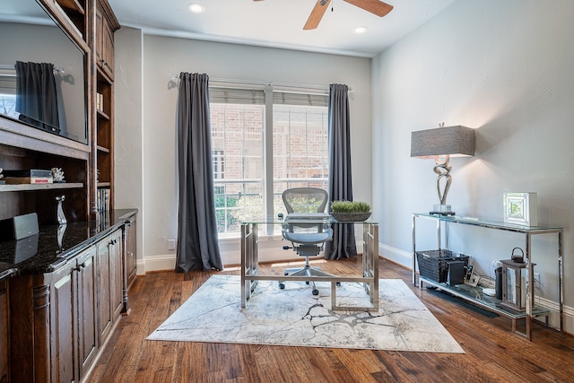 office featuring ceiling fan and dark hardwood / wood-style flooring