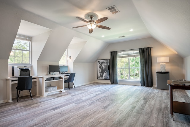 office area featuring a wealth of natural light, ceiling fan, light hardwood / wood-style floors, and lofted ceiling