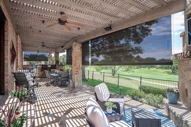 view of patio with outdoor lounge area and ceiling fan