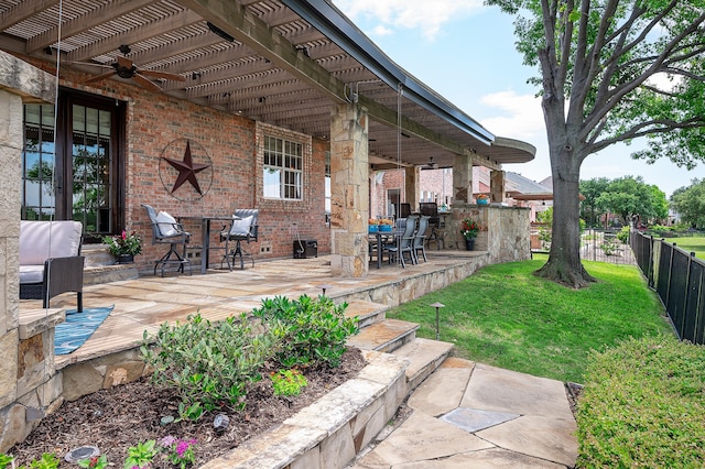 view of patio / terrace featuring a pergola and ceiling fan