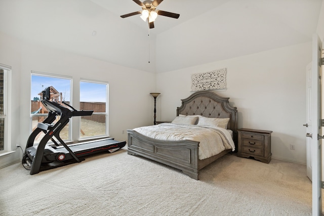 bedroom featuring light carpet, high vaulted ceiling, and ceiling fan