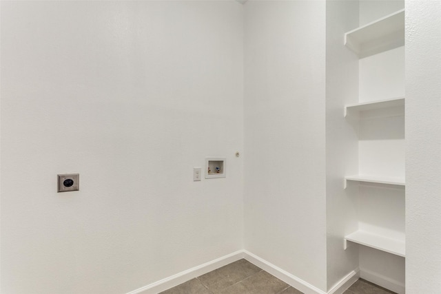 laundry area featuring washer hookup, tile patterned floors, and hookup for an electric dryer