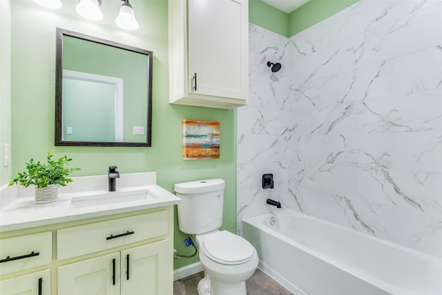 full bathroom with vanity, toilet, and tiled shower / bath