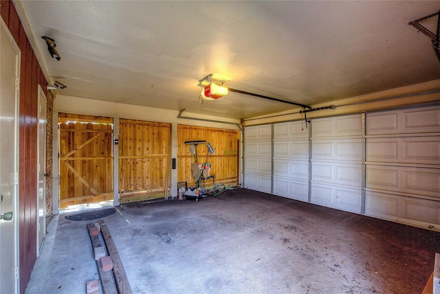 garage featuring a garage door opener