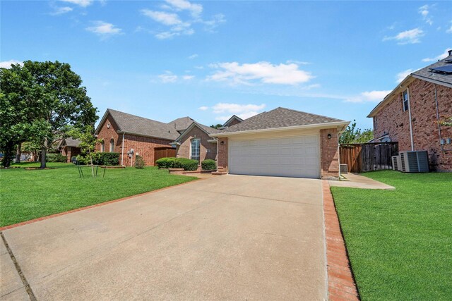 ranch-style house featuring a garage and a front yard