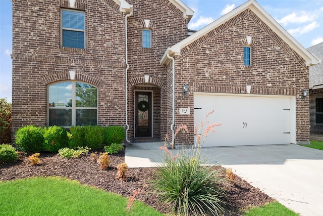 front facade with a garage