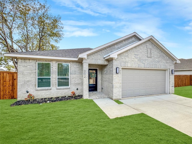 ranch-style house featuring a front yard, fence, an attached garage, a shingled roof, and concrete driveway