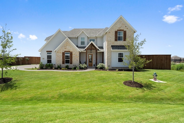 view of front of home with a front lawn