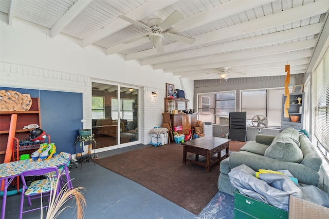 living room with ceiling fan and beam ceiling