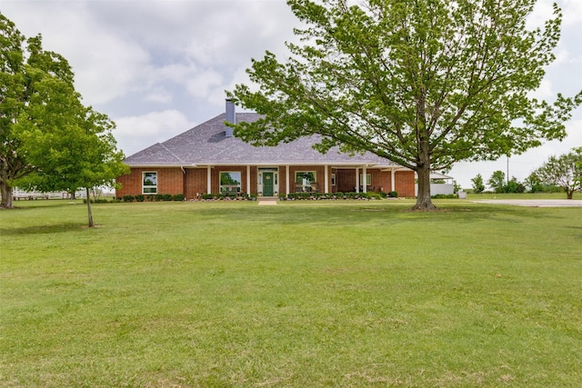 ranch-style house with a front yard