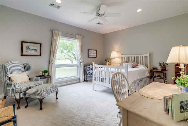 carpeted bedroom featuring ceiling fan