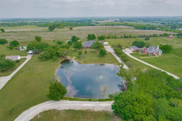 aerial view featuring a rural view and a water view