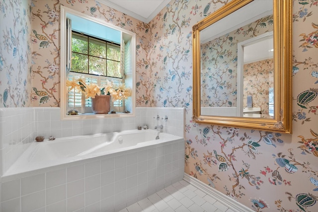 bathroom featuring tile patterned flooring and tiled tub