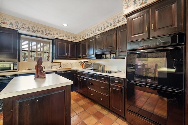 kitchen with dark brown cabinets, a center island, and black appliances