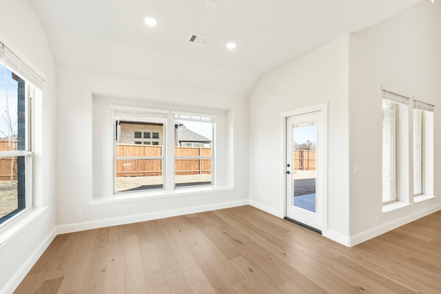 2302 Prosper Way, Mansfield, TX 76063 - unfurnished room with light wood finished floors, a wealth of natural light, and visible vents