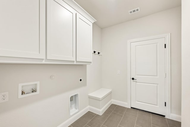 2302 Prosper Way, Mansfield, TX 76063 - laundry area with visible vents, hookup for a gas dryer, washer hookup, hookup for an electric dryer, and cabinet space