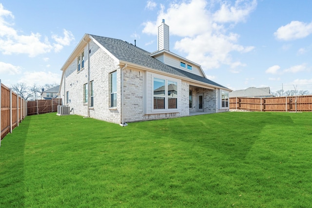 2302 Prosper Way, Mansfield, TX 76063 - rear view of property featuring a chimney, a fenced backyard, brick siding, a lawn, and cooling unit