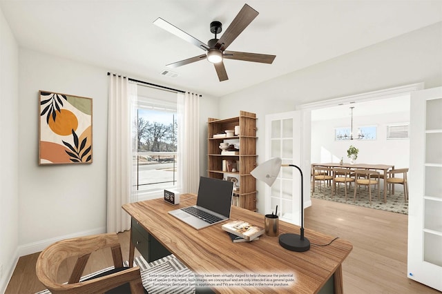 2302 Prosper Way, Mansfield, TX 76063 - office area with ceiling fan with notable chandelier, visible vents, baseboards, and light wood-type flooring