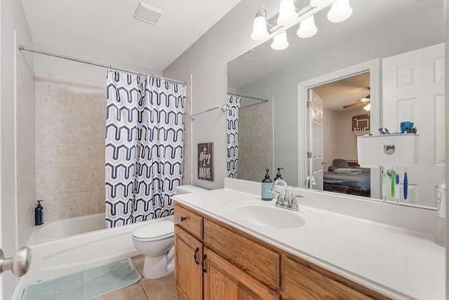 full bathroom featuring toilet, vanity, shower / bath combination with curtain, ceiling fan, and tile patterned flooring