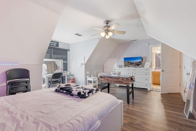 bedroom with vaulted ceiling, dark hardwood / wood-style flooring, and ceiling fan