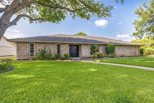 ranch-style house with a front yard