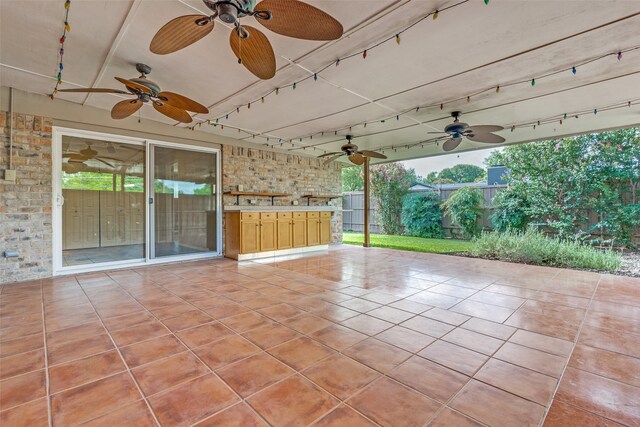 view of patio with ceiling fan