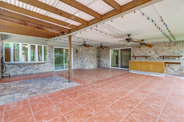 view of patio / terrace with a pergola and ceiling fan