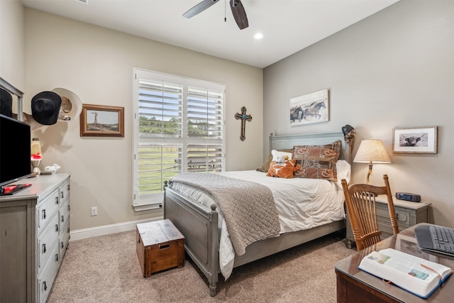 carpeted bedroom with ceiling fan